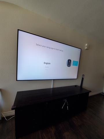 Clean TV wall install with furniture below