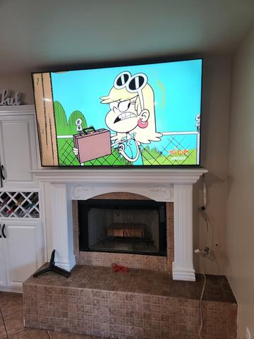 Finished TV install showing centered placement on wall