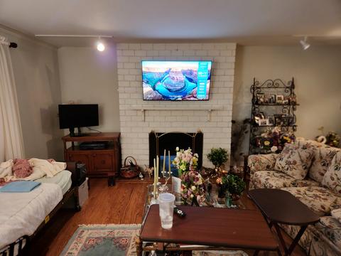 Nighttime TV wall mount with ambient lighting